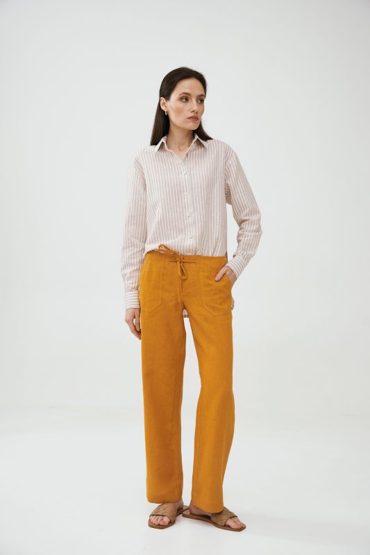 Штани з накладними кишенями